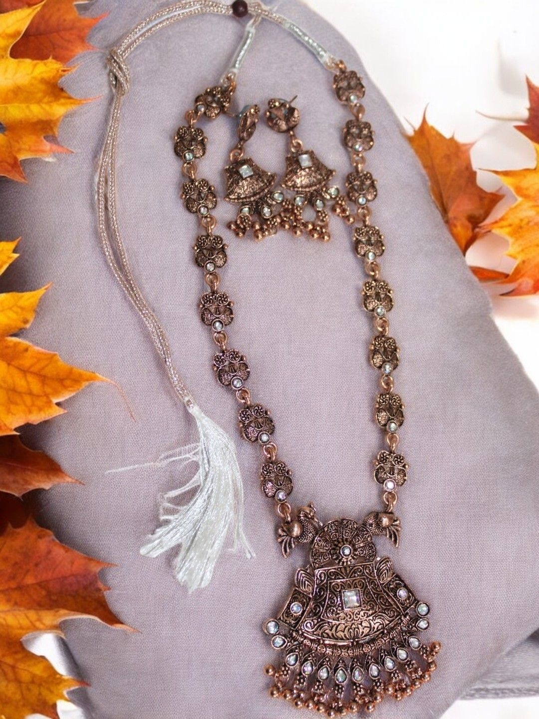 

Jolly Faces Copper-Plated Stone-Studded Jewellery Set
