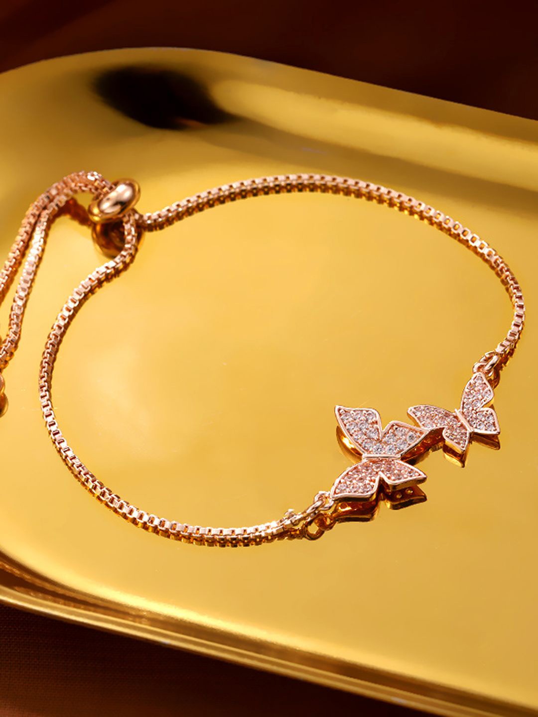 

Peora Rose Gold-Plated Cubic Zirconia Studded Butterfly Shaped Wraparound Bracelet