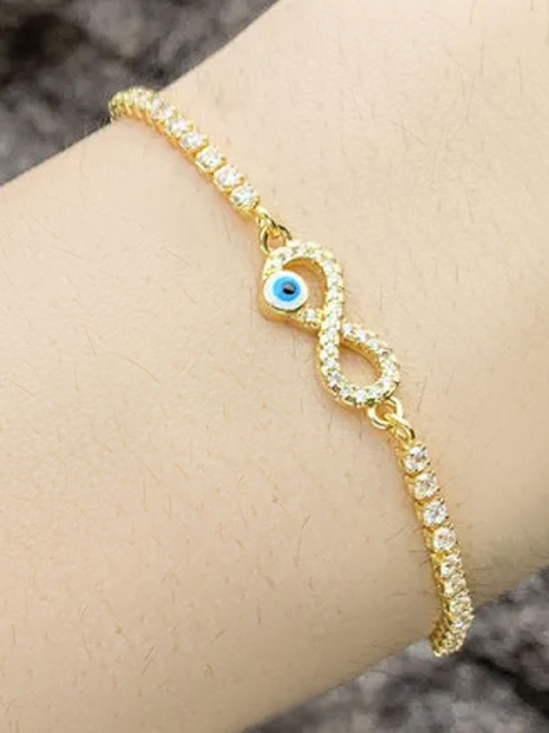 

Peora Gold Plated Cubic Zirconia Studded Fancy Evil Eye Adjustable Wraparound Bracelet