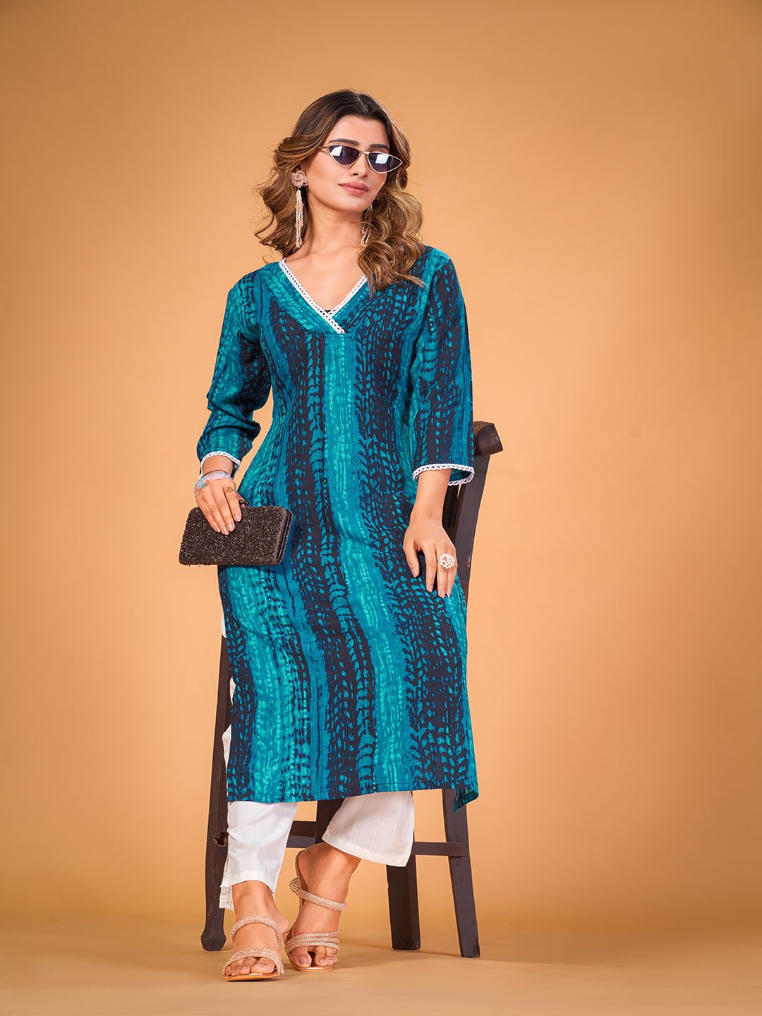 

PATDOM Women Abstract Printed V-Neck Straight Kurta, Blue