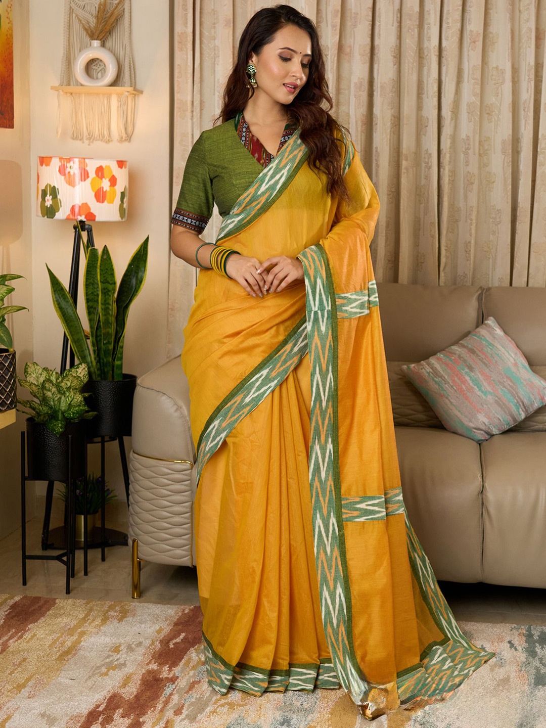 

Prasam Ikat Border Solid Saree, Yellow