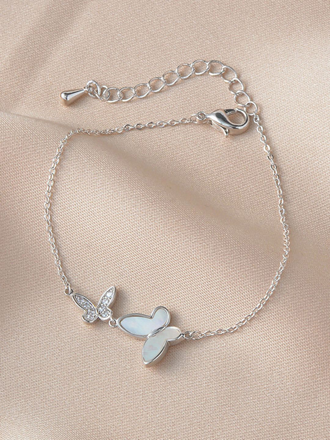 

Peora Silver-Plated Cubic Zirconia Studded Butterfly Style Adjustable Wraparound Bracelet