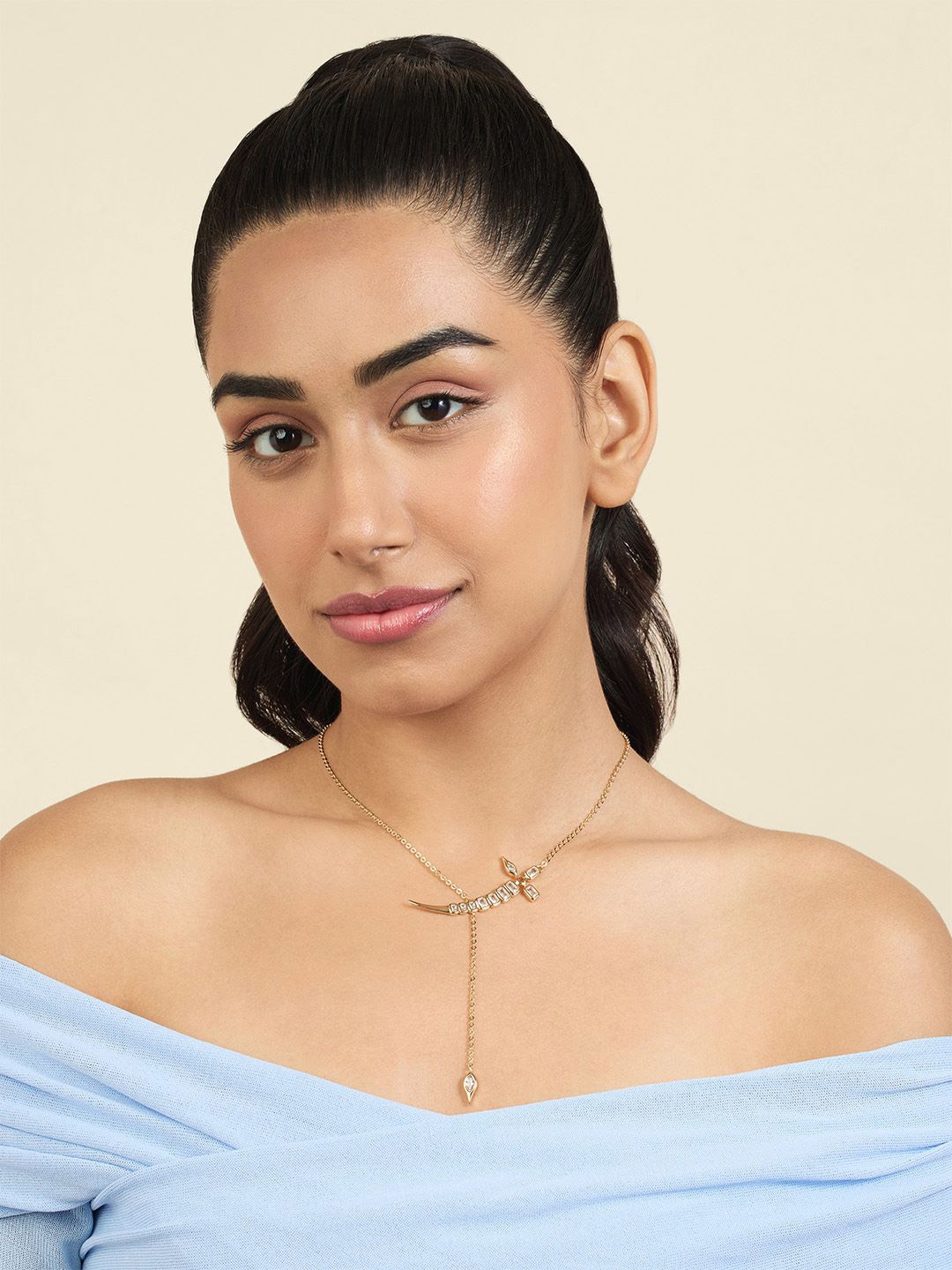 

Isharya Brass 18KT Gold-Plated Cubic Zirconia Stone Studded Tennis Sword Y Necklace