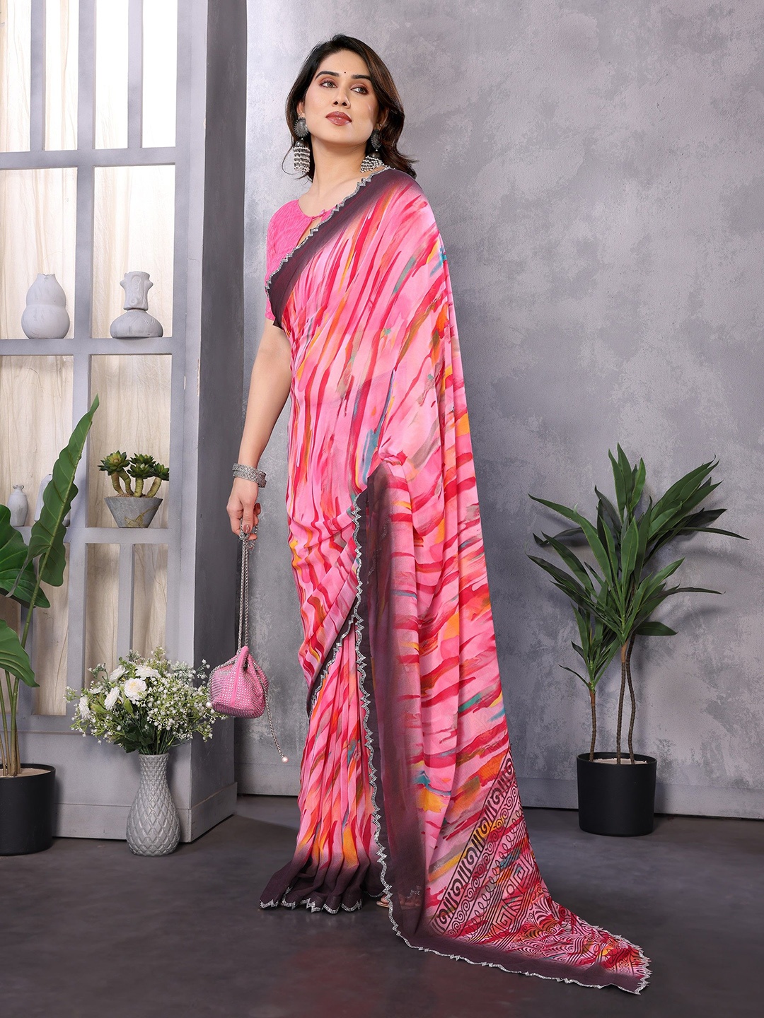 

Nirmohi Fashion Striped Beads and Stones Pure Georgette Saree, Pink