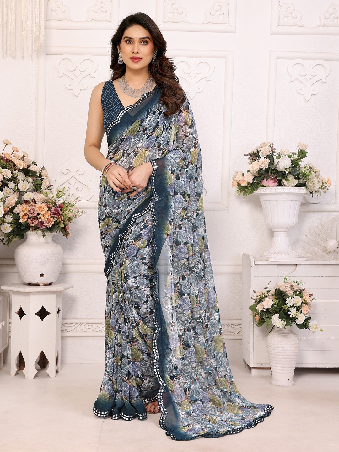 

Nirmohi Fashion Floral Printed Mirror Work Pure Georgette Saree, Teal