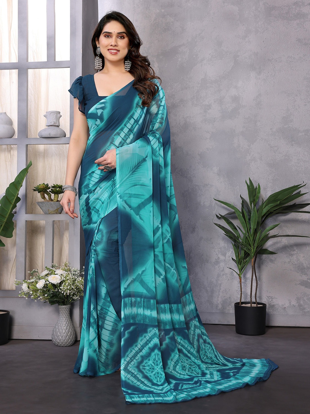 

Nirmohi Fashion Tie & Dye Pure Georgette Saree, Teal