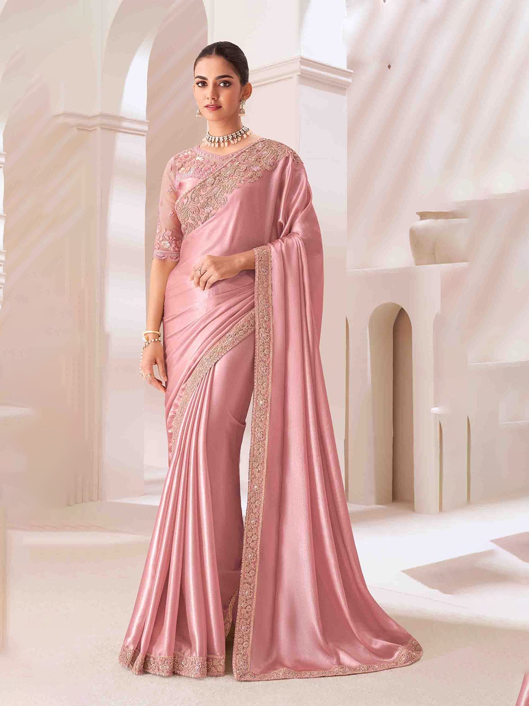 

Mitera Embroidered Pure Georgette Saree, Peach