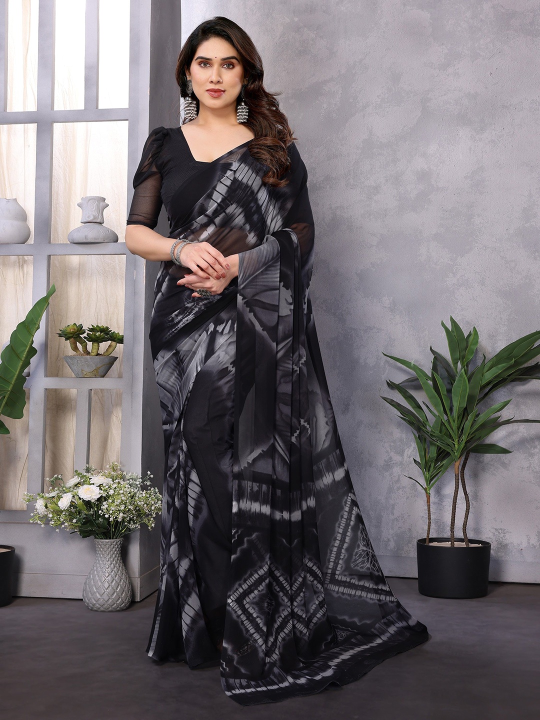 

Nirmohi Fashion Abstract Printed Pure Georgette Saree, Black