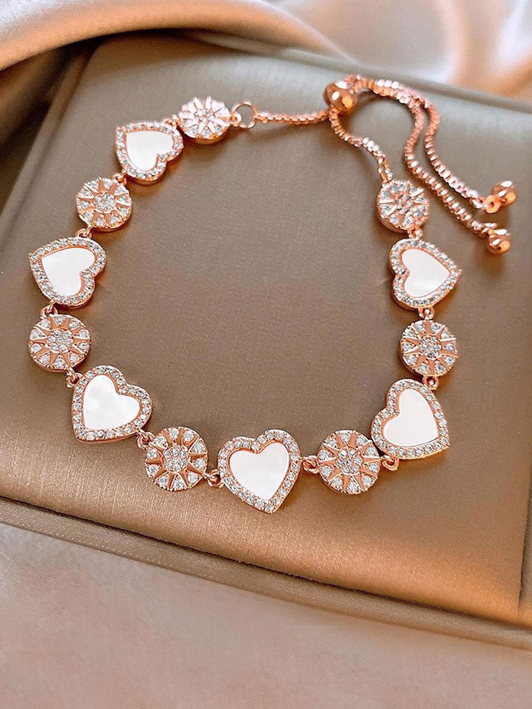 

Peora Rose Gold-Plated Cubic Zirconia Studded Heart Shaped Wraparound AdjustableBracelet