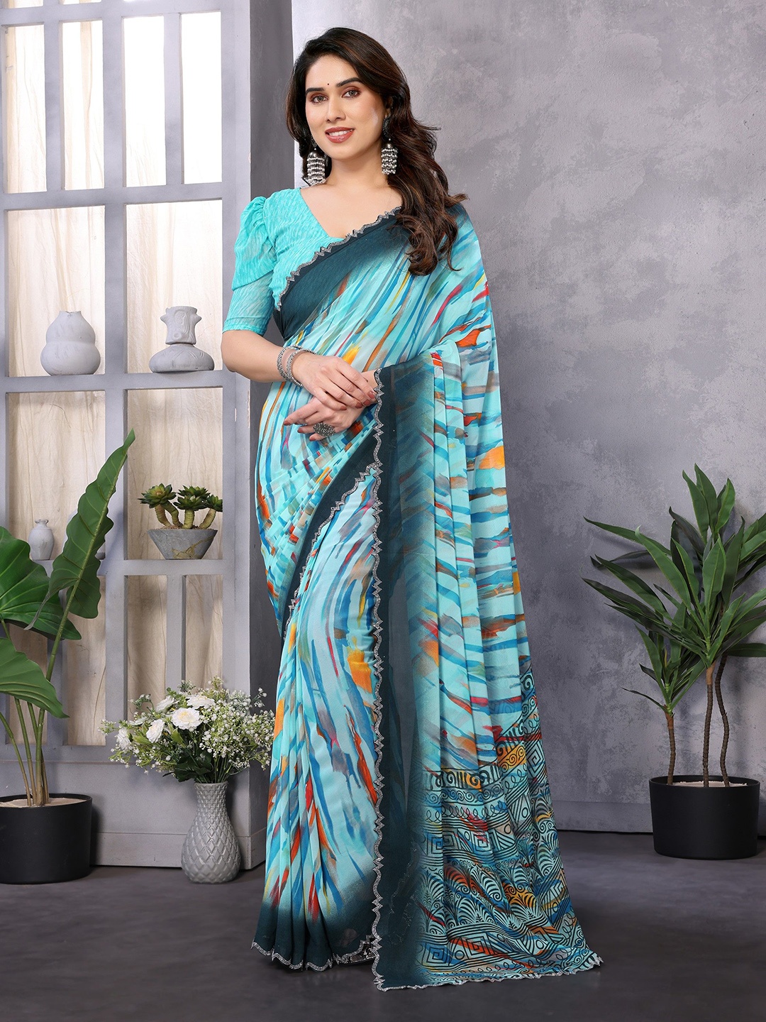 

Nirmohi Fashion Beads and Stones Saree, Sea green