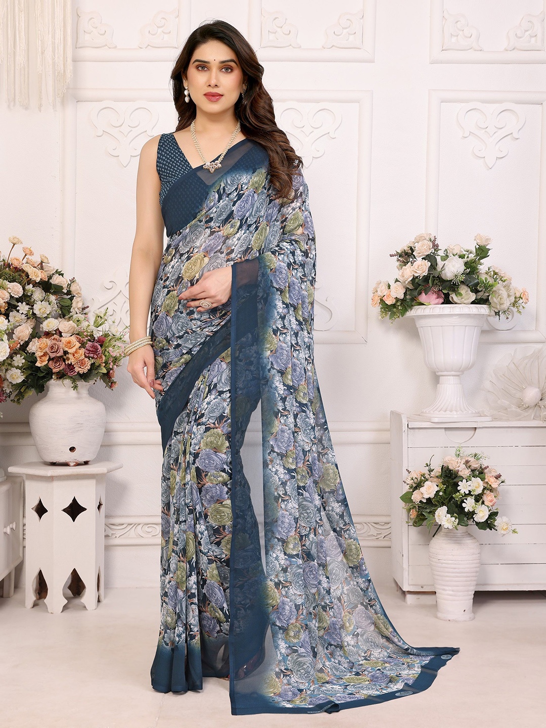 

Nirmohi Fashion Floral Printed Pure Georgette Saree, Teal