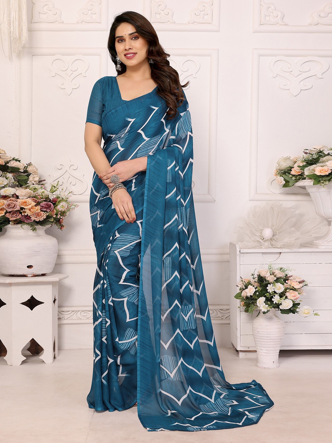 

Nirmohi Fashion Leheriya Saree, Teal