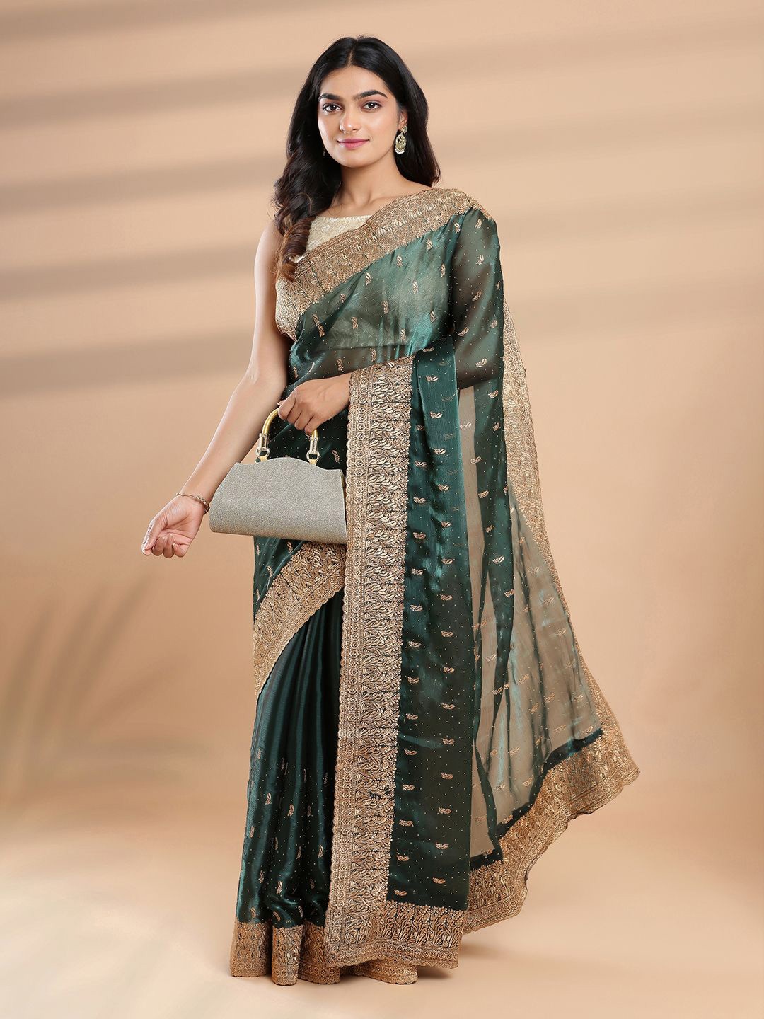

Kalyan Silks Ethnic Motifs Beads and Stones Organza Saree, Green
