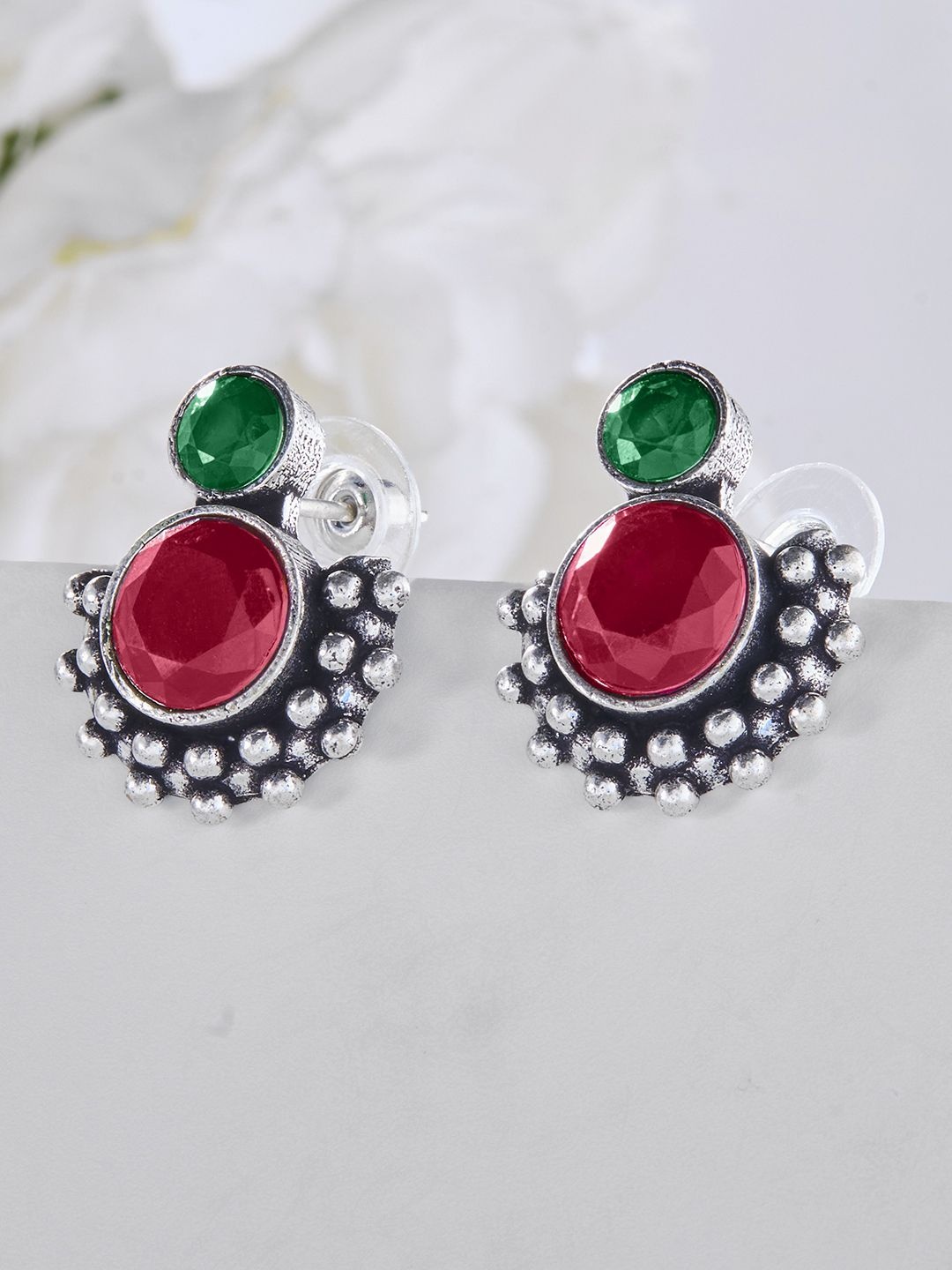 

Priyaasi Silver Plated Faux Ruby Oxidized Contemporary Studs Earrings