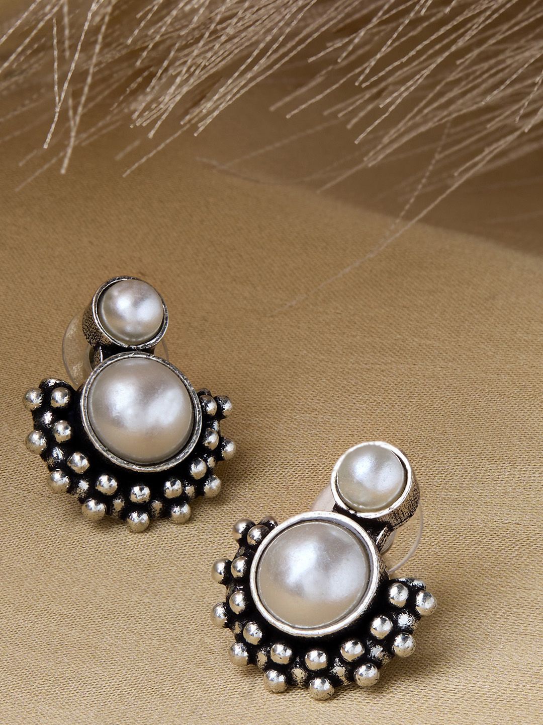 

Priyaasi Silver Plated Contemporary Pearls Beaded Studs Earrings