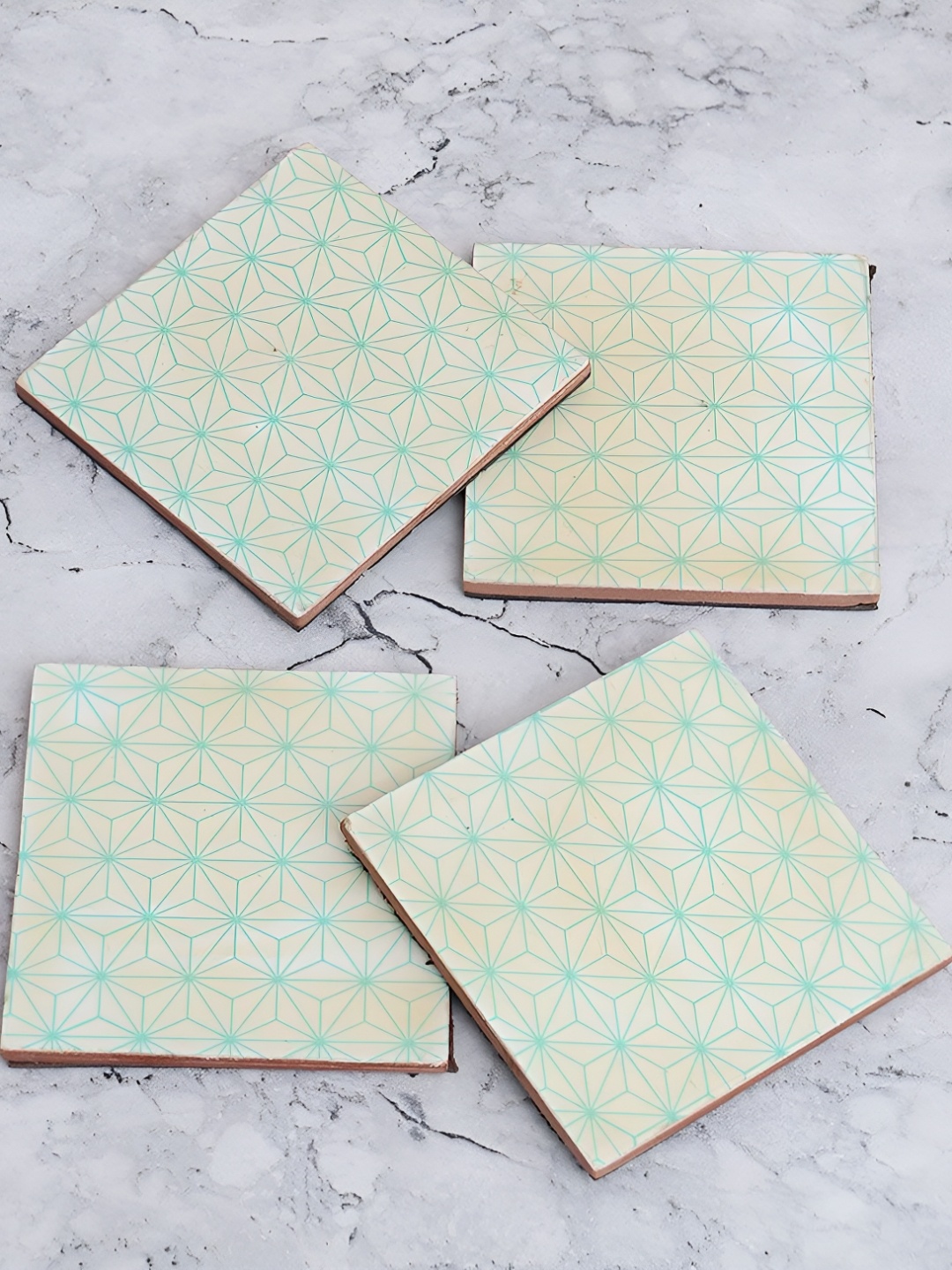 

Indianshelf Turquoise Blue And White 4 Pieces Geometric Wood Square Coasters