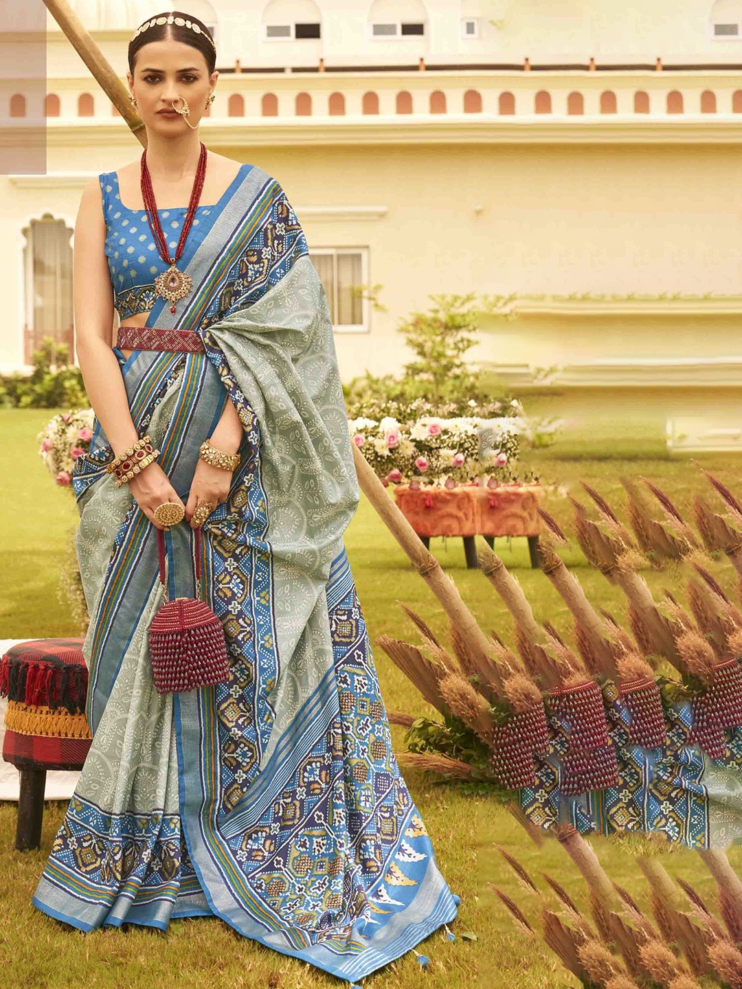 

KIMISHA Abstract Printed Woven Design Zari Patola Saree, Blue