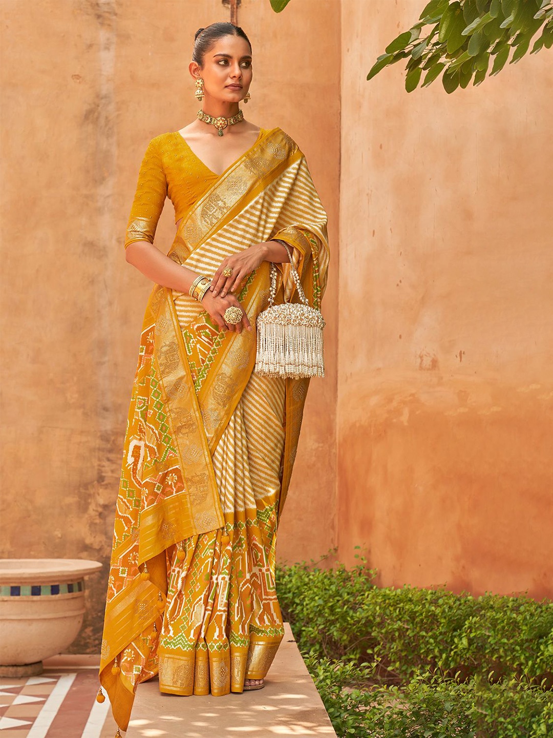 

DEVATITHI Kalamkari Beads and Stones Silk Blend Patola Saree, Yellow