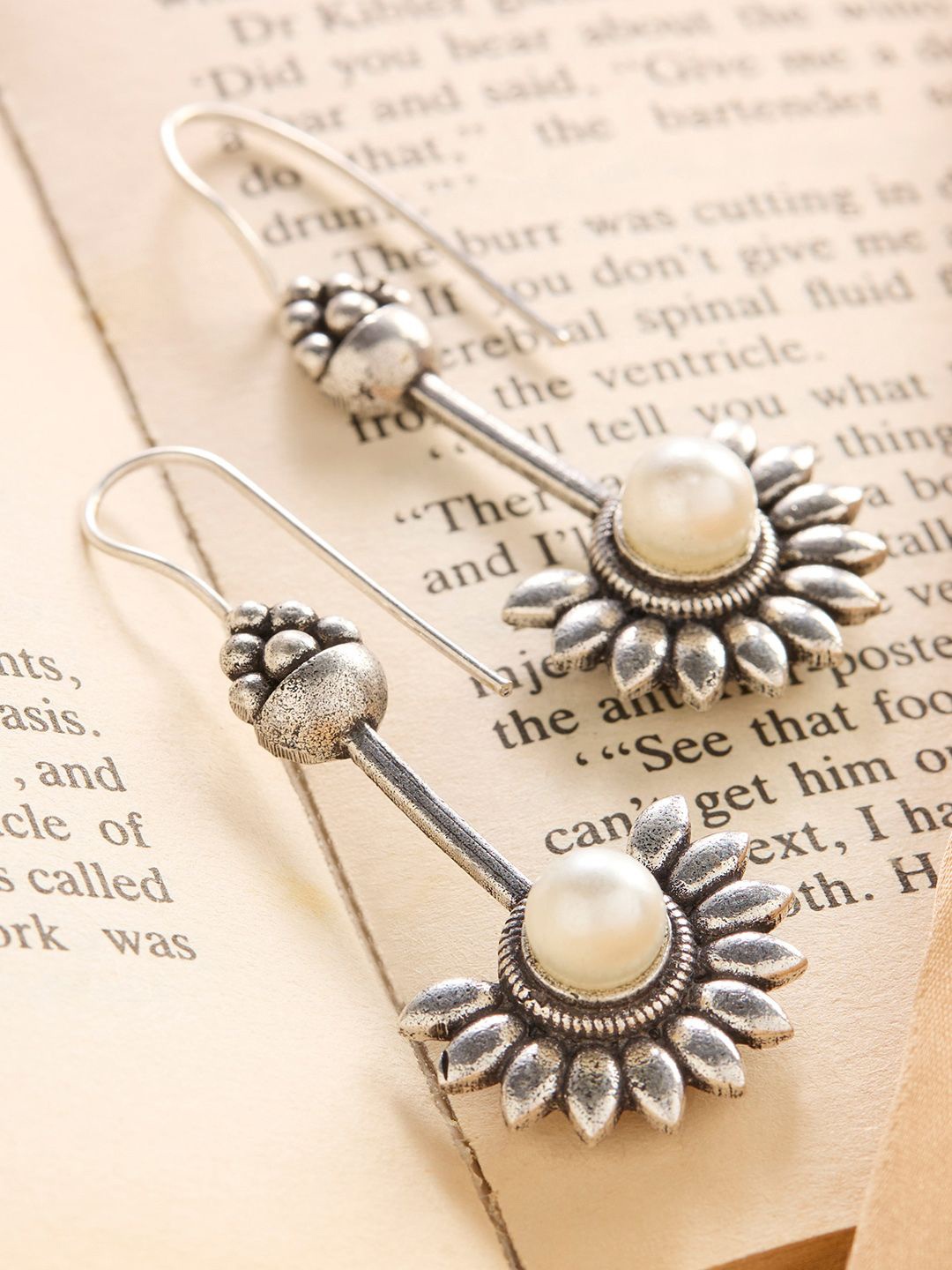 

Priyaasi Silver Plated Pearls Studded Contemporary Oxidized Drop Earrings