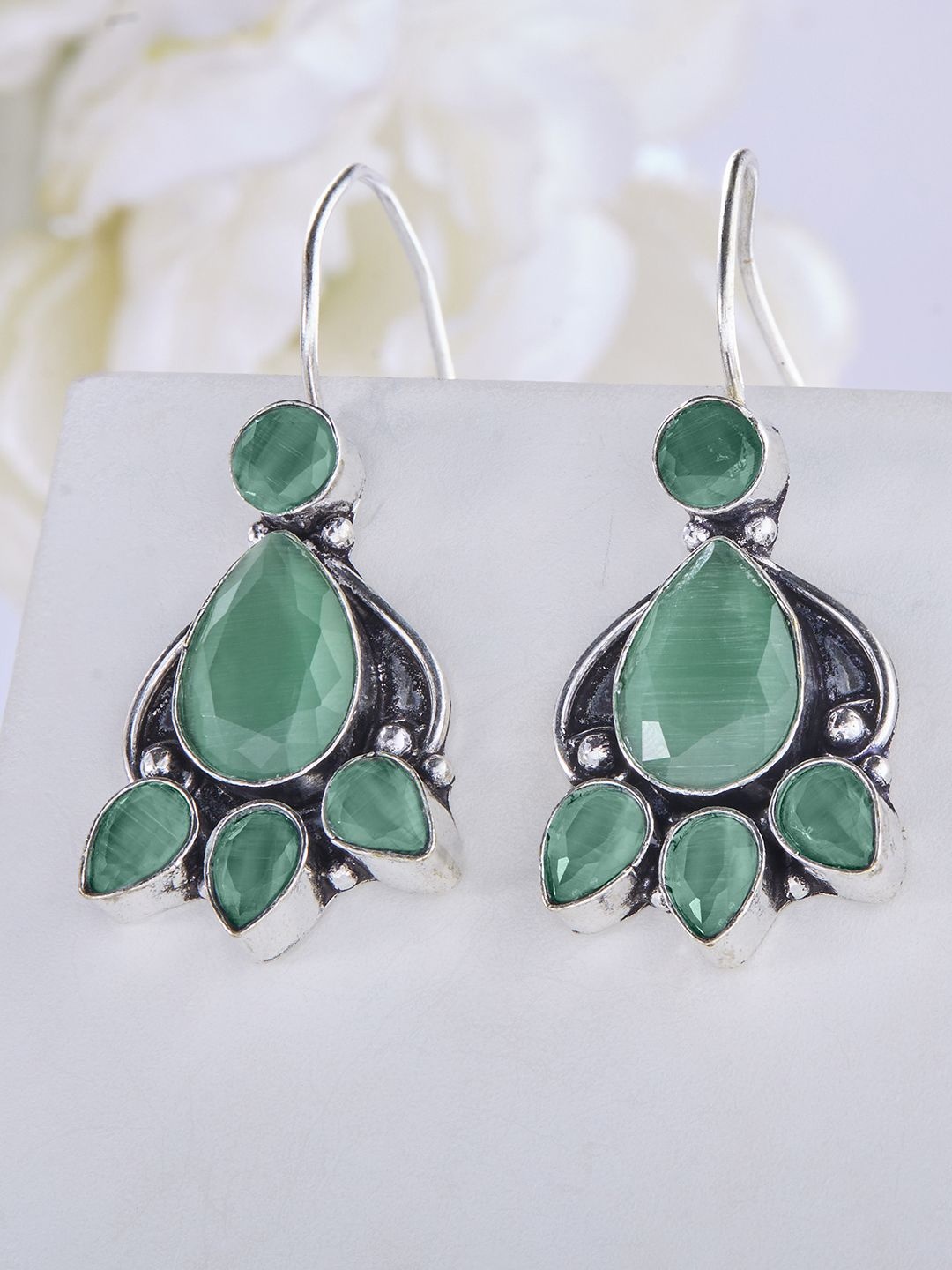 

Priyaasi Silver Plated Emerald Studded Oxidised Contemporary Drop Earrings