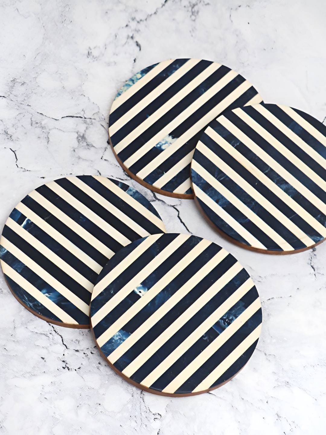 

Indianshelf Blue & White 4 Pieces Striped Round Shaped Wooden Coasters