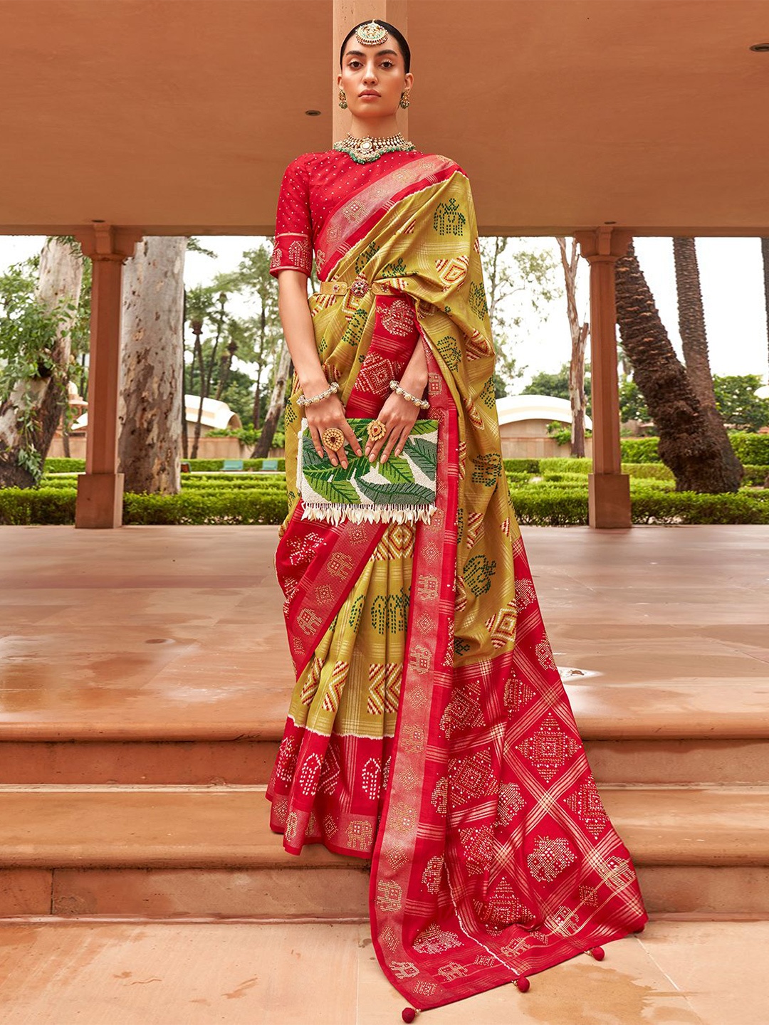 

DEVATITHI Kalamkari Mirror Work Silk Blend Patola Saree, Mustard