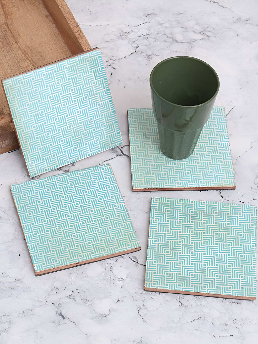 

Indianshelf Turquoise-Blue & Beige 4 Pieces Printed Wooden Dining Table Coasters