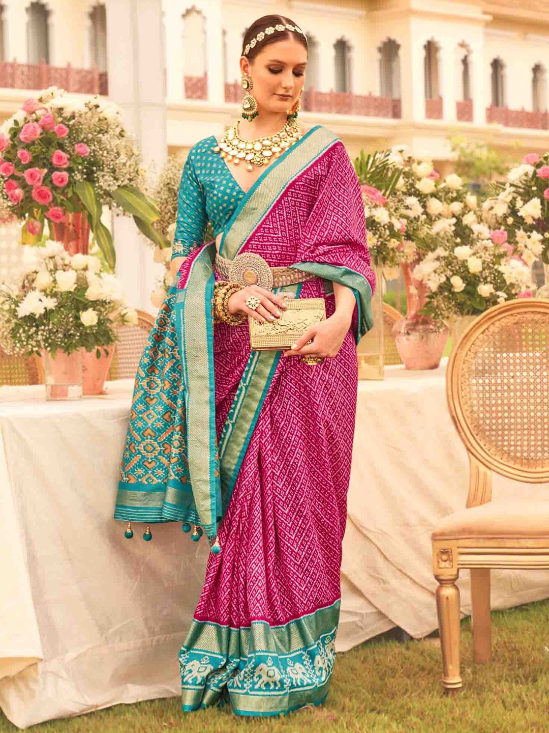 

KIMISHA Woven Design Zari Patola Saree, Magenta