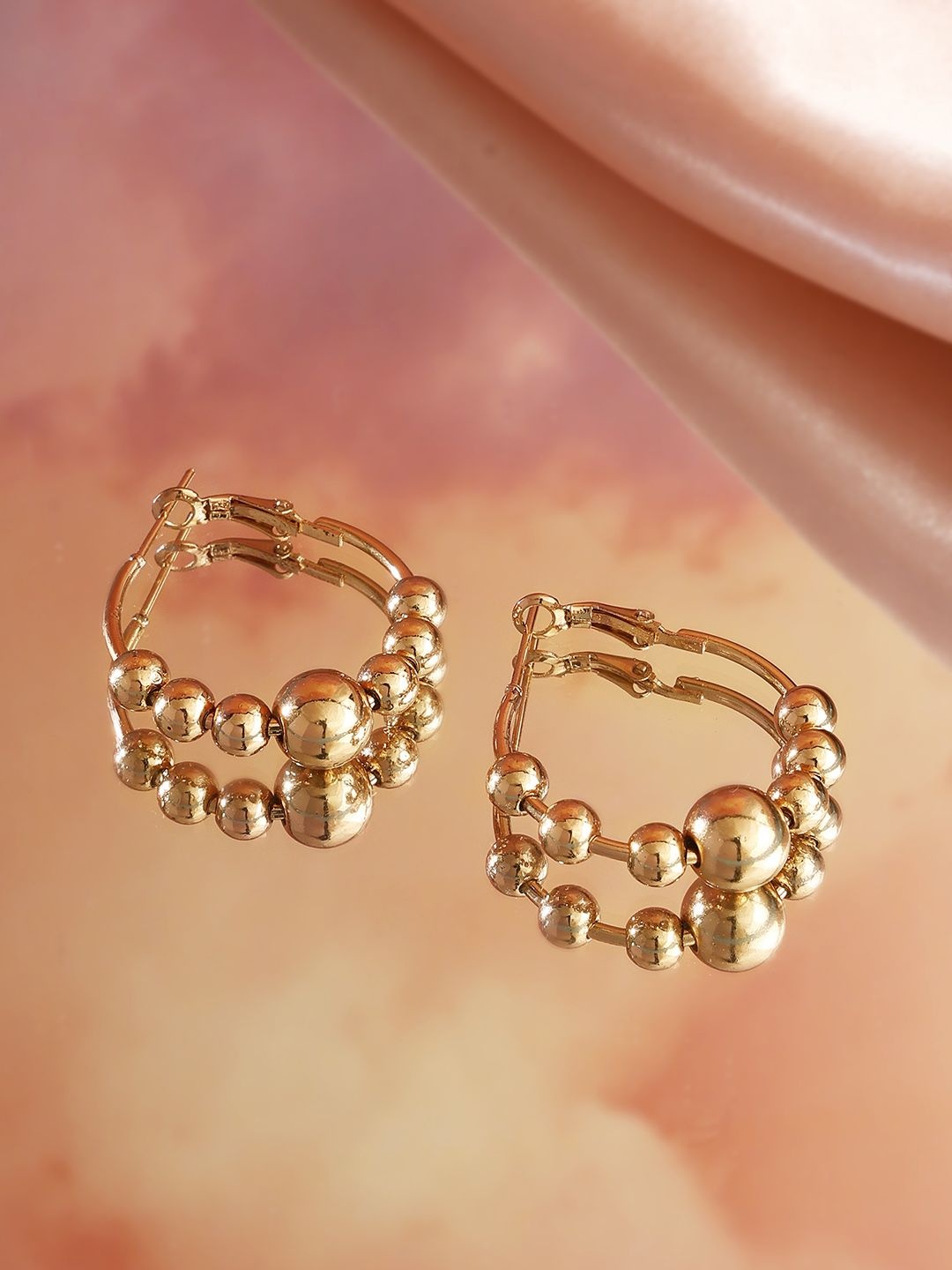 

Priyaasi Gold Plated Contemporary Drop Earrings