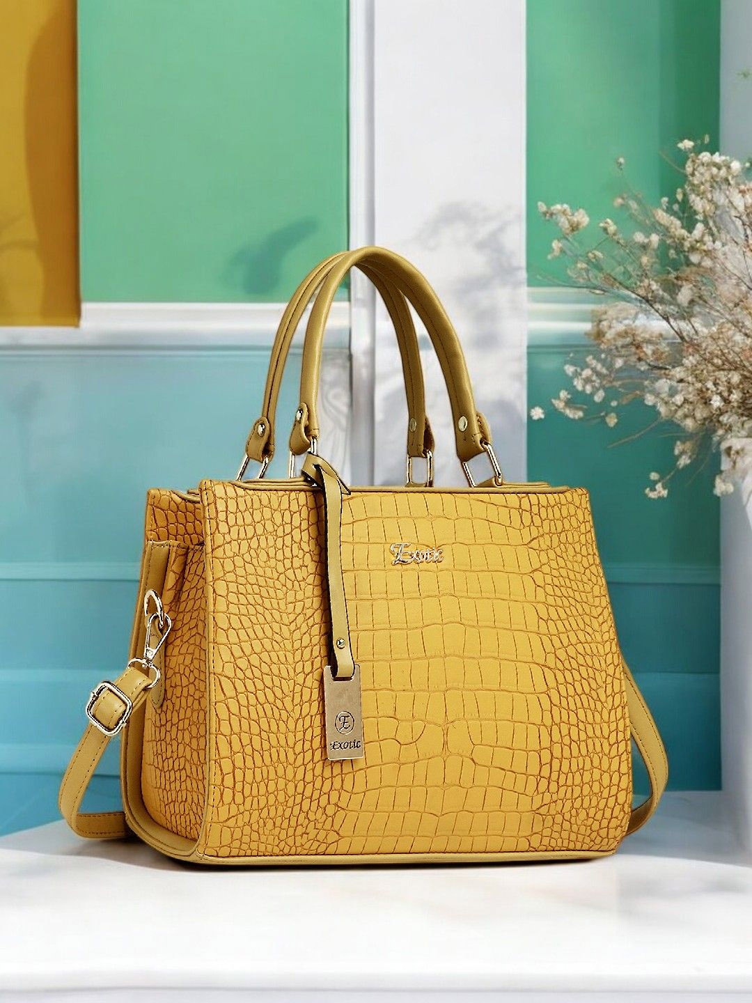 

Exotic Colourblocked Structured Handheld Bag with Fringed, Yellow