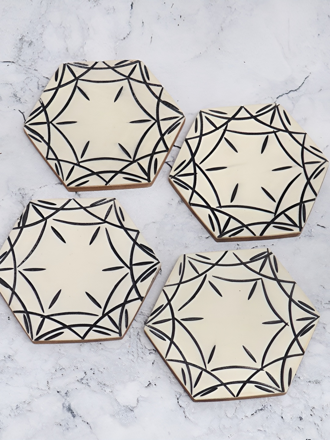 

Indianshelf Beige & Black 4 Pieces Printed Hexagonal Wooden Dining Table Coasters