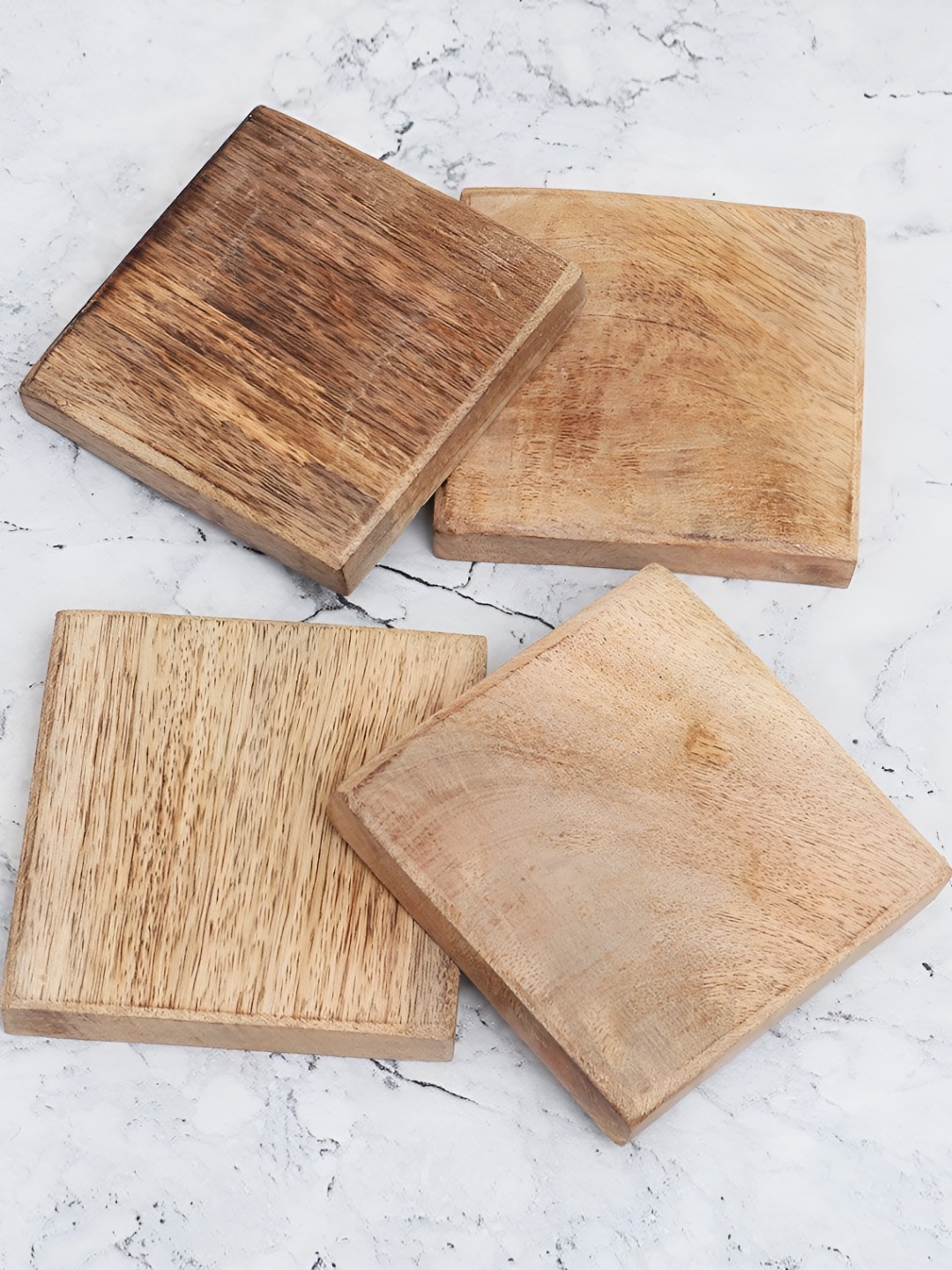 

Indianshelf 4-Pieces Brown Patterned Wooden Dining Table Coasters