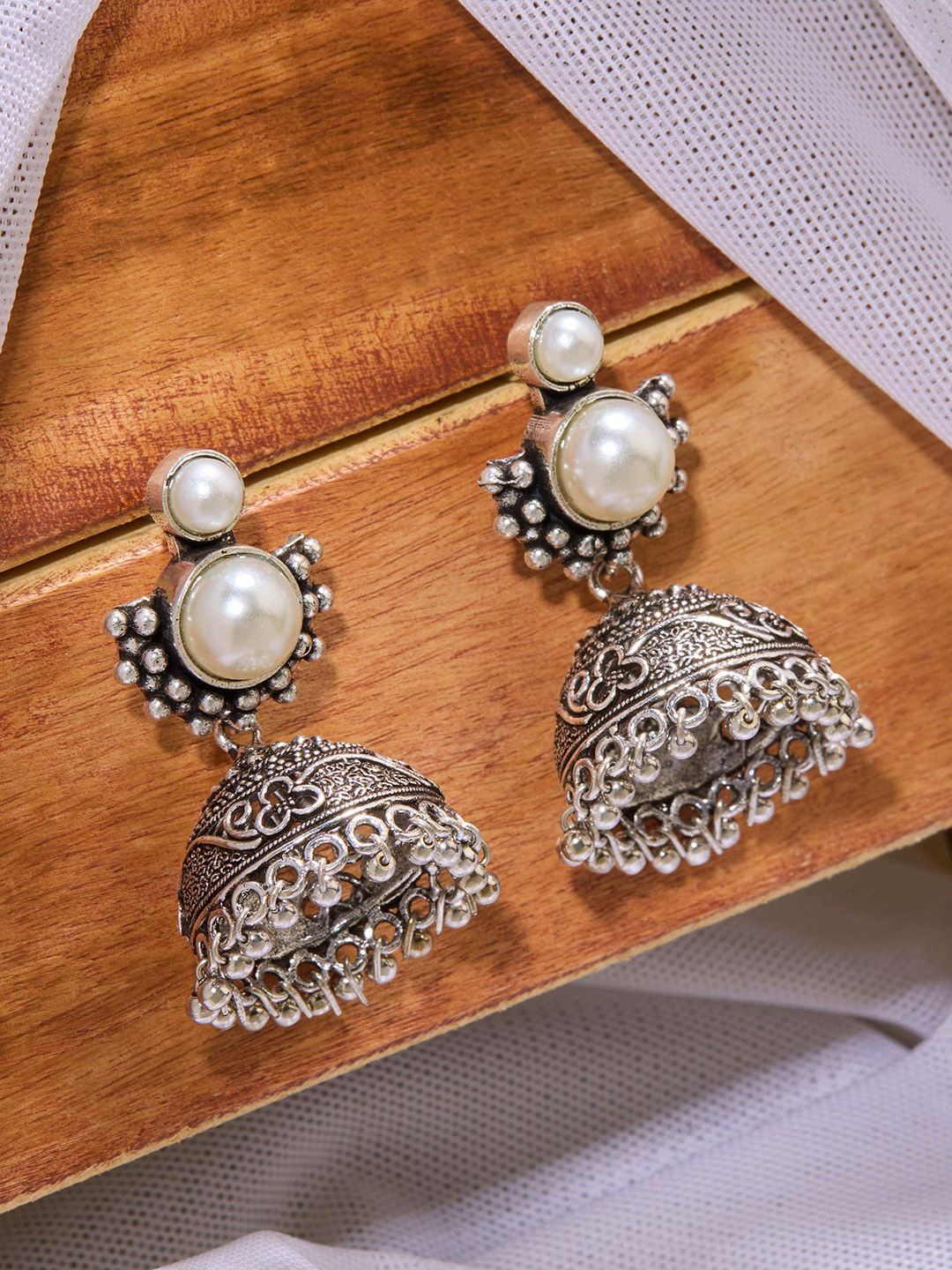 

Priyaasi Silver-Plated Dome Shaped Pearls Oxidised Jhumkas Earrings