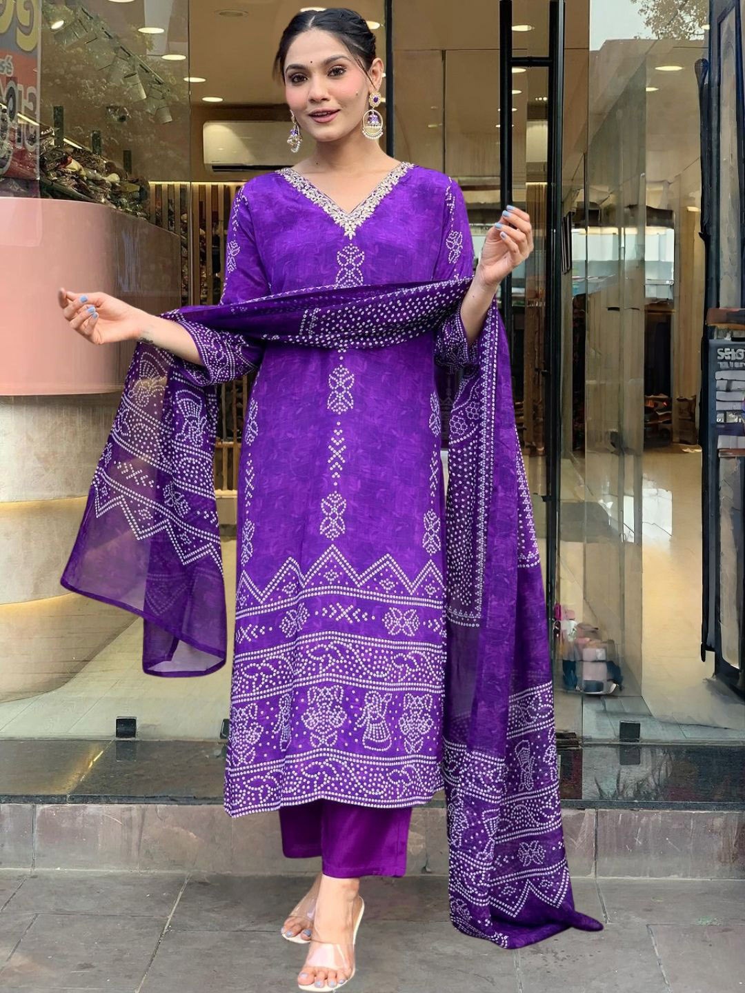 

KALINI Bandhani Printed Gotta Patti Work V Neck Kurta With Trousers And Dupatta, Purple