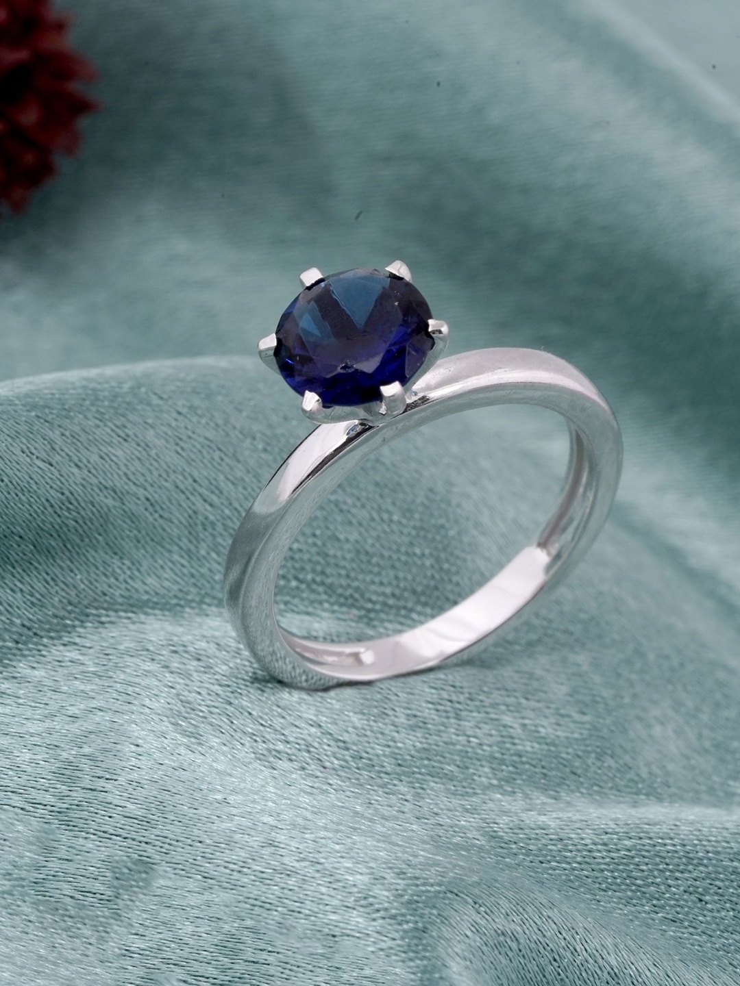 

Zalkari Silver-Plated Cubic Zirconia Studded Solitaire Sapphire Finger Ring