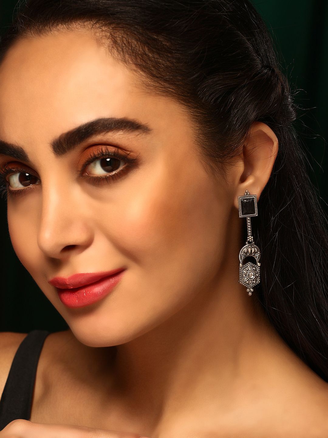 

Priyaasi Silver Plated Artificial Stone Studded Floral Oxidised Contemporary Drop Earrings