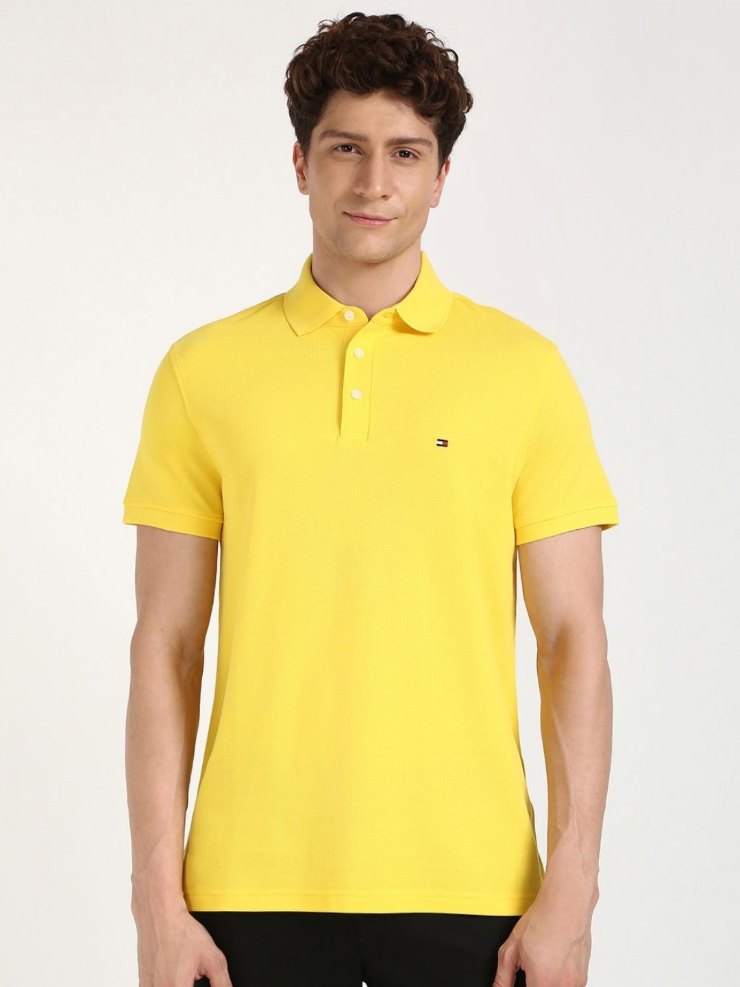 

Tommy Hilfiger Men Solid Polo Collar Organic Cotton Slim Fit T-shirt, Yellow