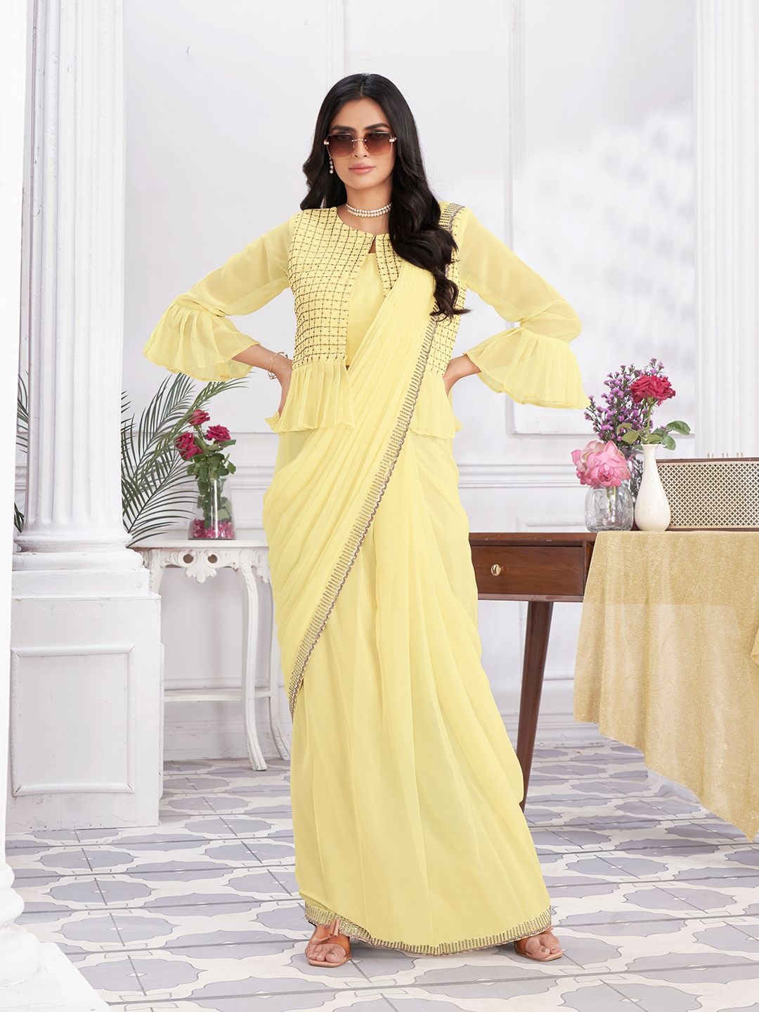 

Krimmple Pure Georgette Embellished Saree, Yellow