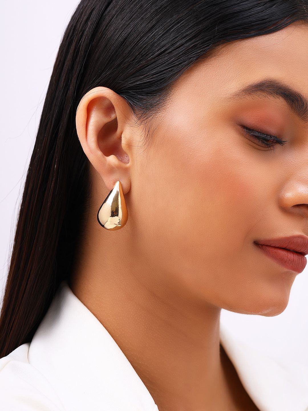

Priyaasi Gold-Plated Contemporary Studs Earrings