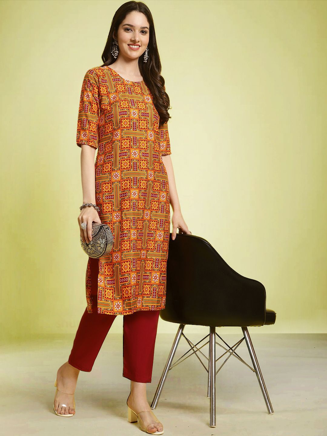 

Moda Rapido Ethnic Motifs Printed Round Neck Straight Kurta with Trousers, Mustard