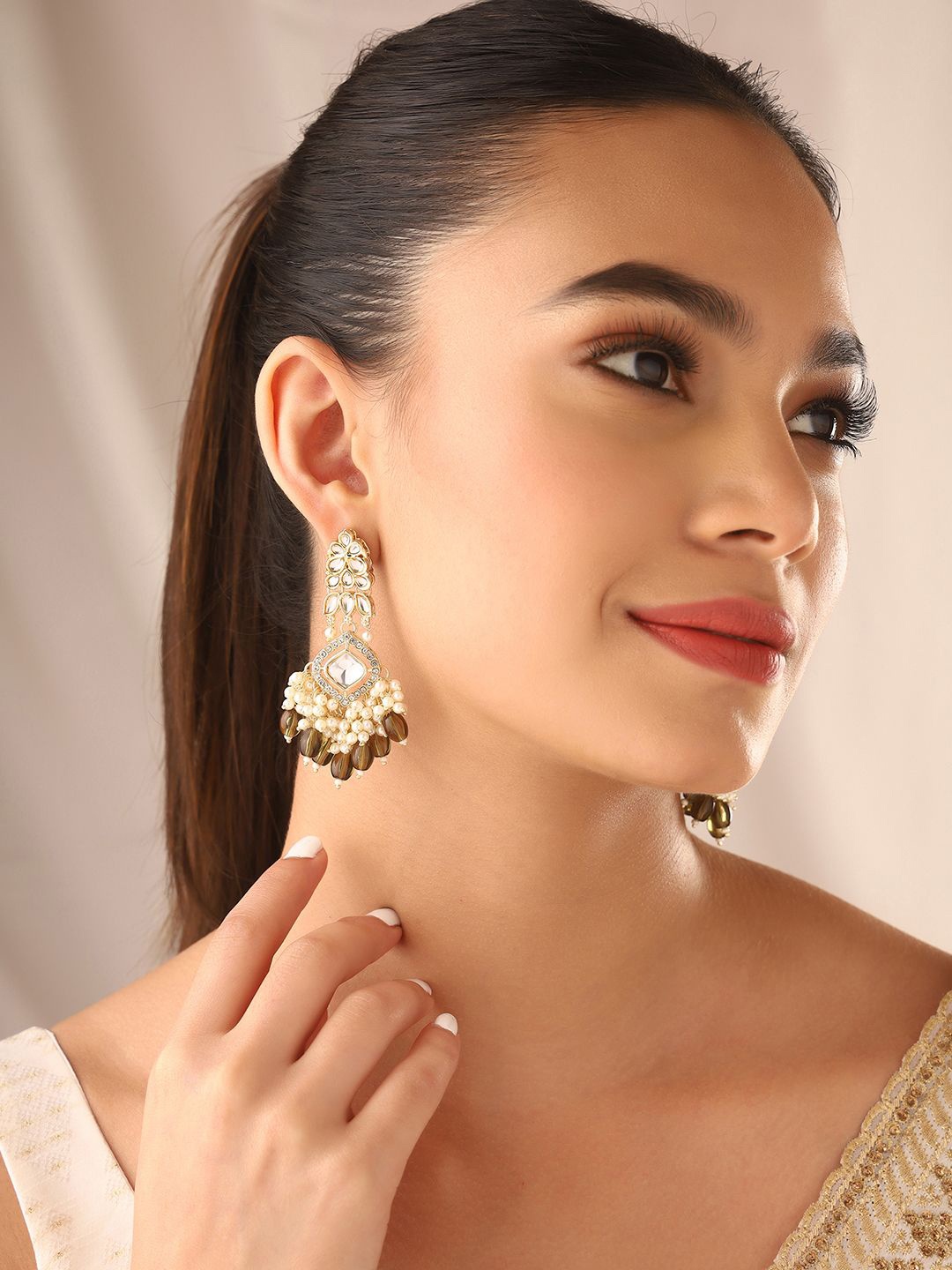 

Priyaasi Gold Plated Kundan Contemporary Drop Earrings