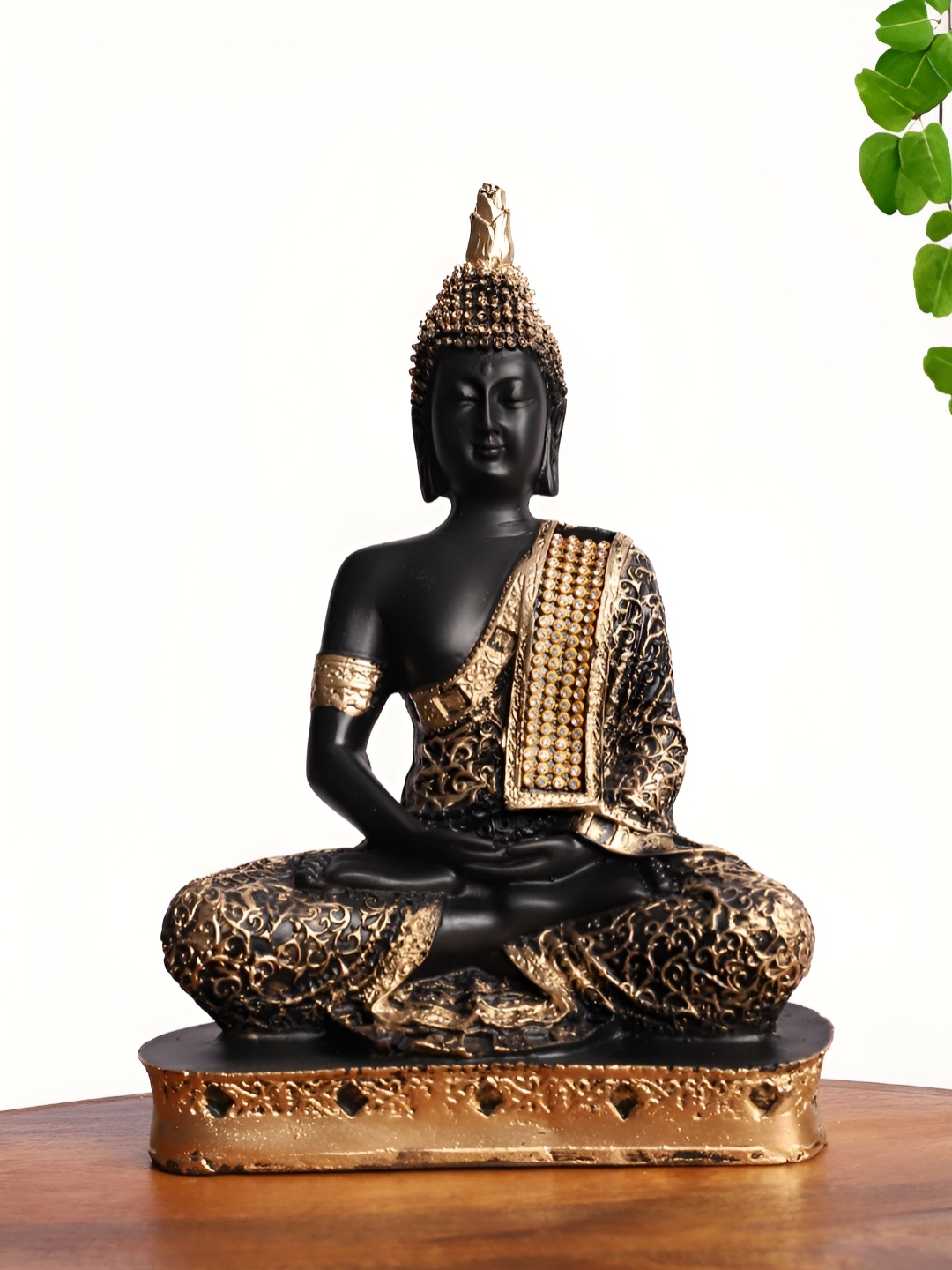 

INTERNATIONAL GIFT Black And Gold Toned Meditating Buddha Statue Idol Showpiece