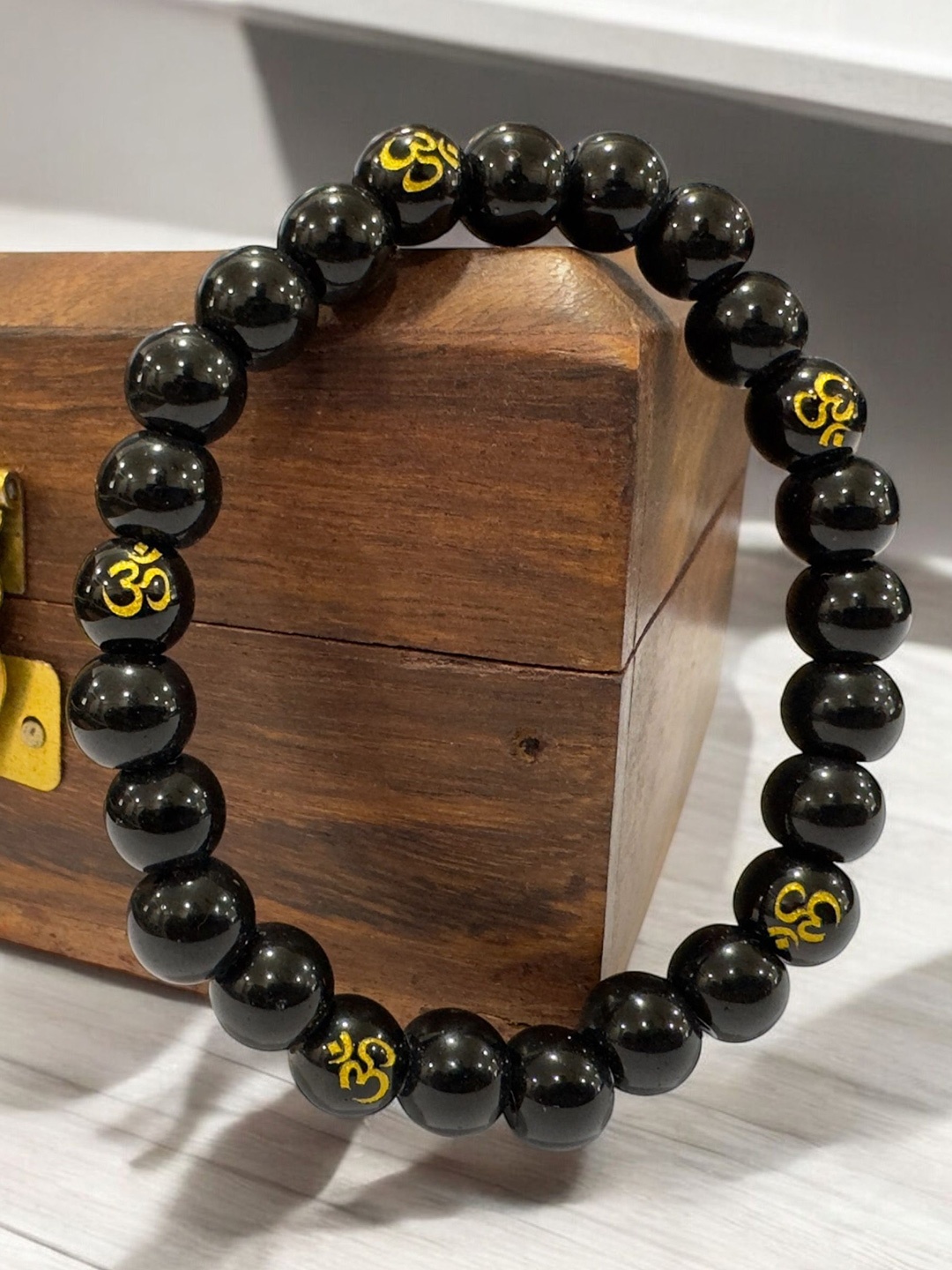 

AKLINA Om Printed Gem Stone Beaded Ceramic Elasticated Bracelet, Black