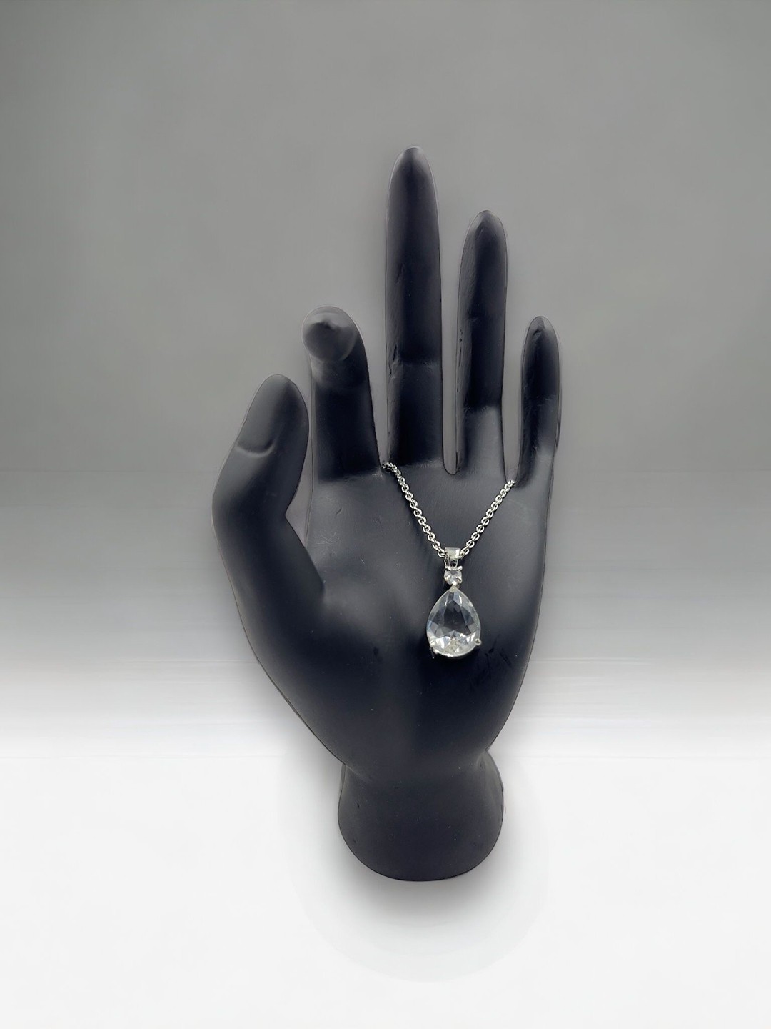 

AKLINA Rhodium-Plated Cubic Zirconia Studded Teardrop Shaped Pendant with Chain, Silver
