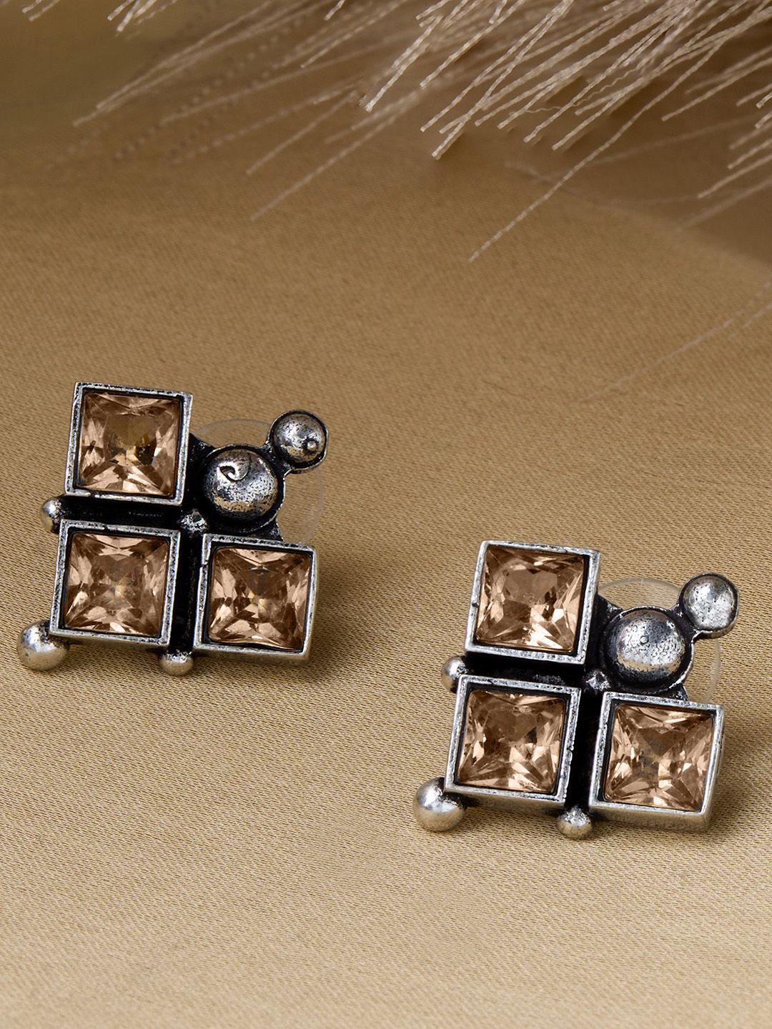 

Priyaasi Silver Plated Artificial Stones Oxidised Contemporary Studs Earrings