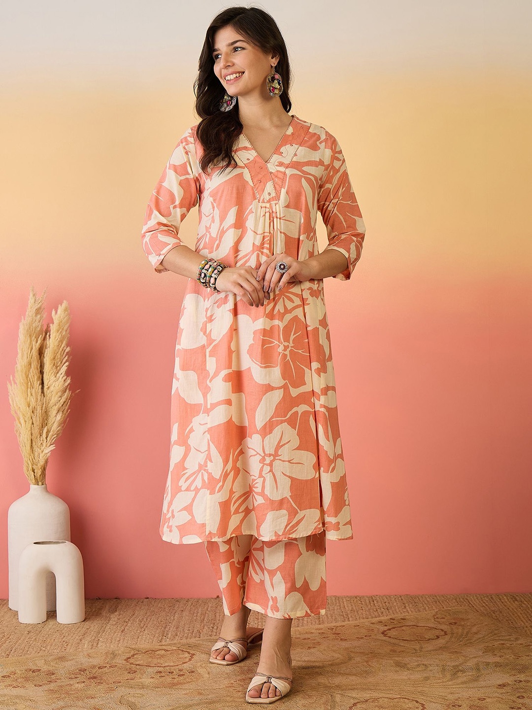 

Sangria Orange Floral Printed V-Neck A-Line Pure Cotton Kurta Set