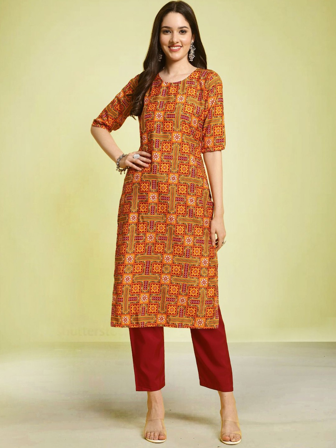 

Moda Rapido Ethnic Motifs Printed Round Neck Straight Kurta with Trousers, Orange