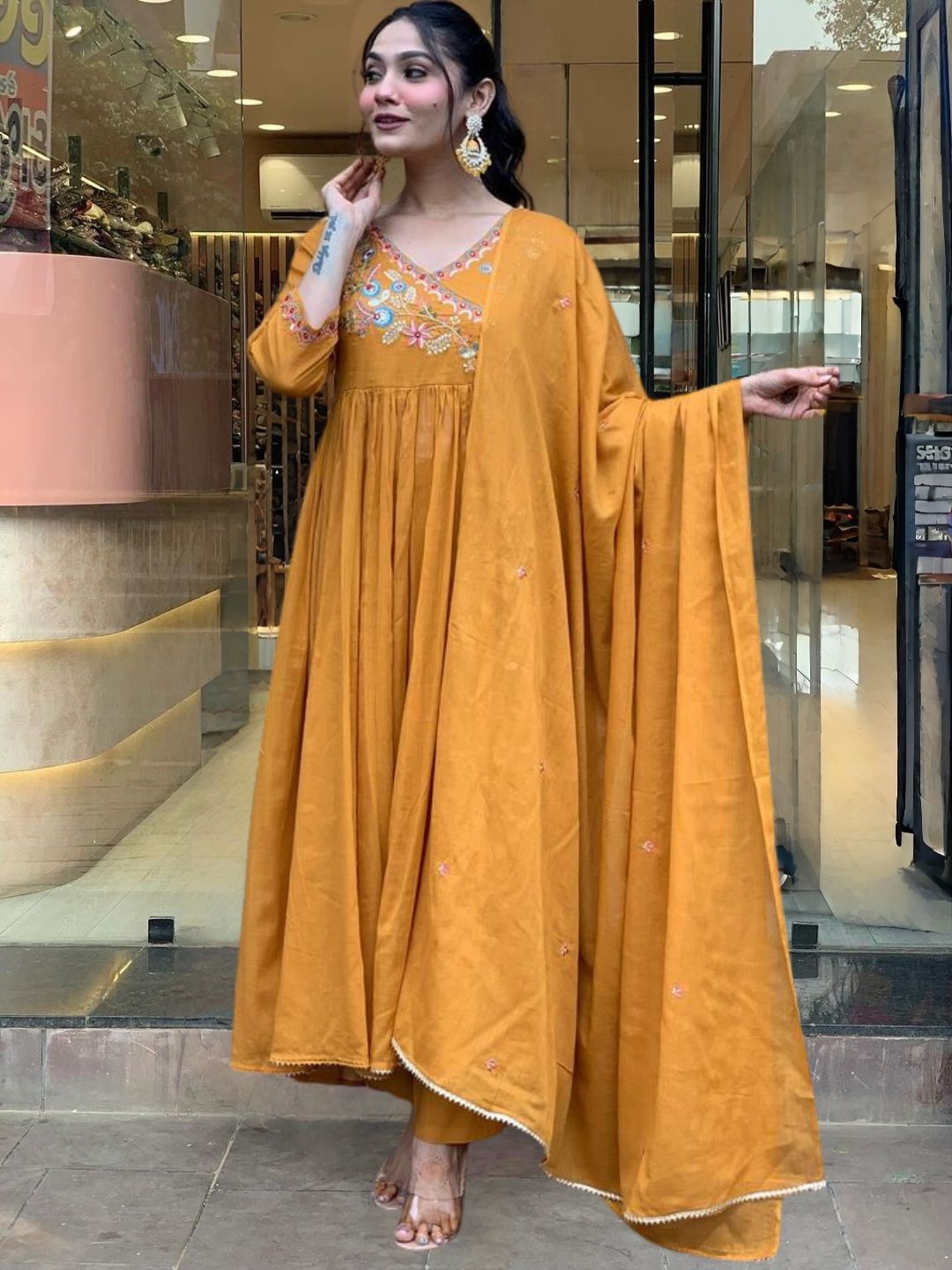 

KALINI Floral Embroidered Sequinned Work V Neck Angrakha Kurta With Trousers And Dupatta, Orange