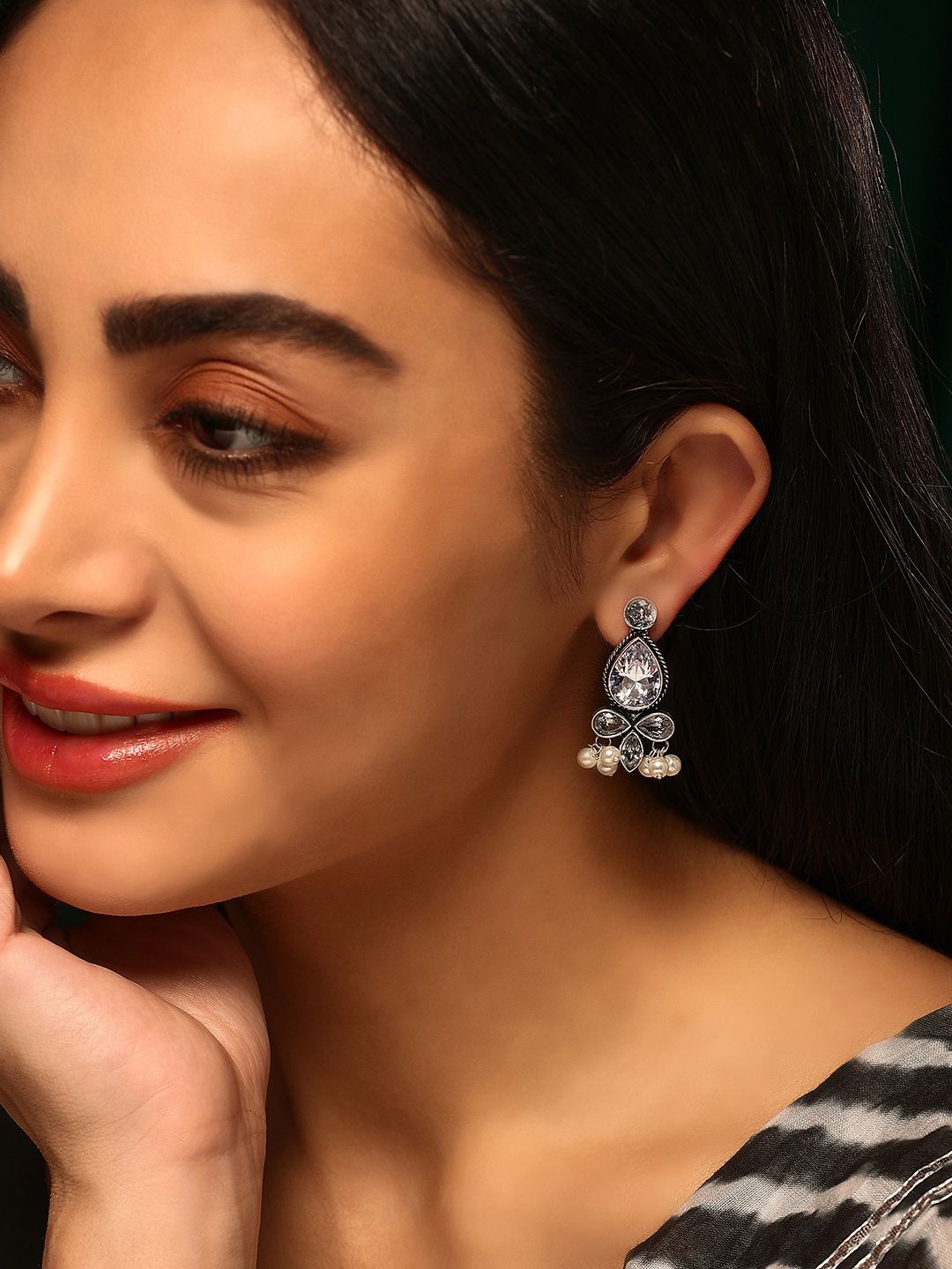 

Priyaasi Silver-Plated Crystals Studded Oxidised Contemporary Drop Earrings