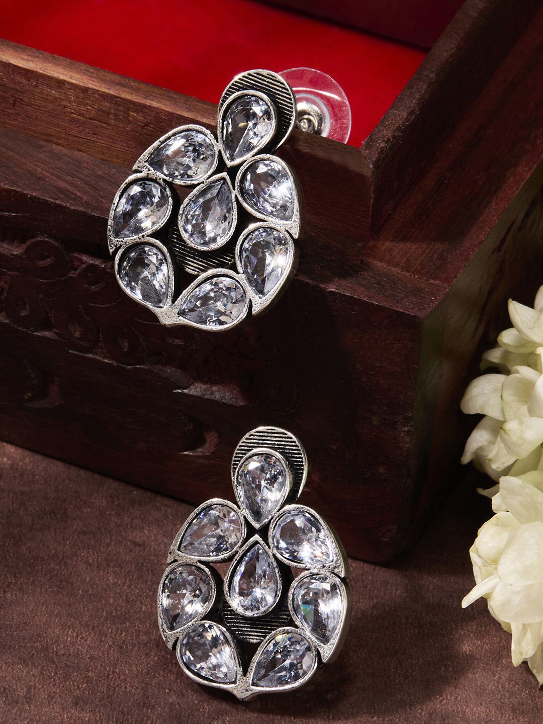 

Priyaasi Silver Plated Crystals Studded Contemporary Oxidized Studs Earrings